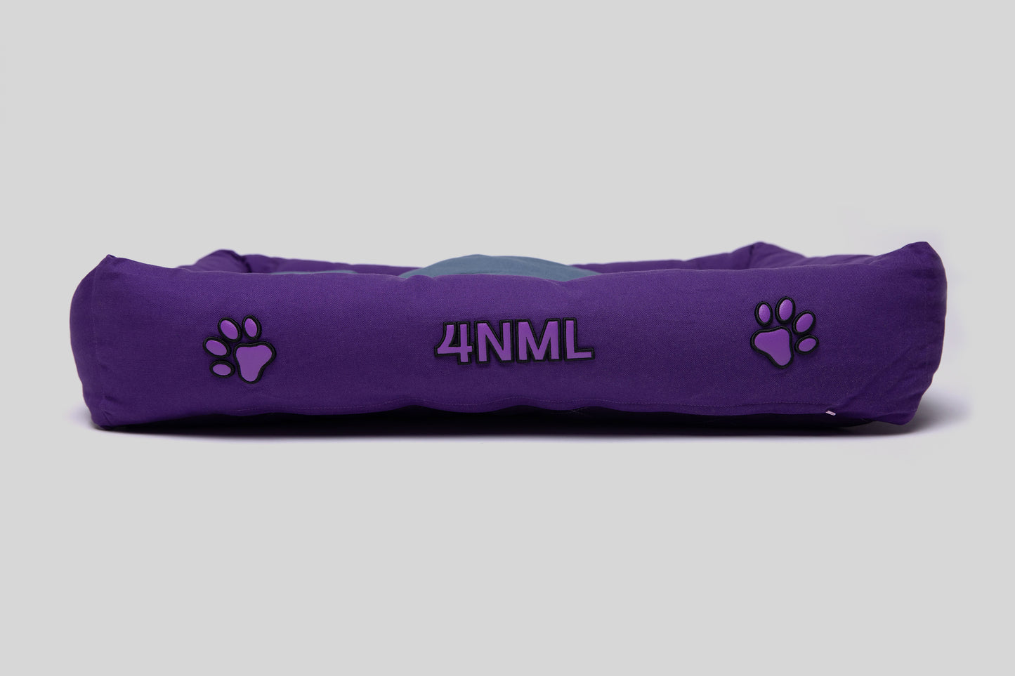 Side view of canvas cotton pet bed with lavender AppleSkin embroidery, purple base