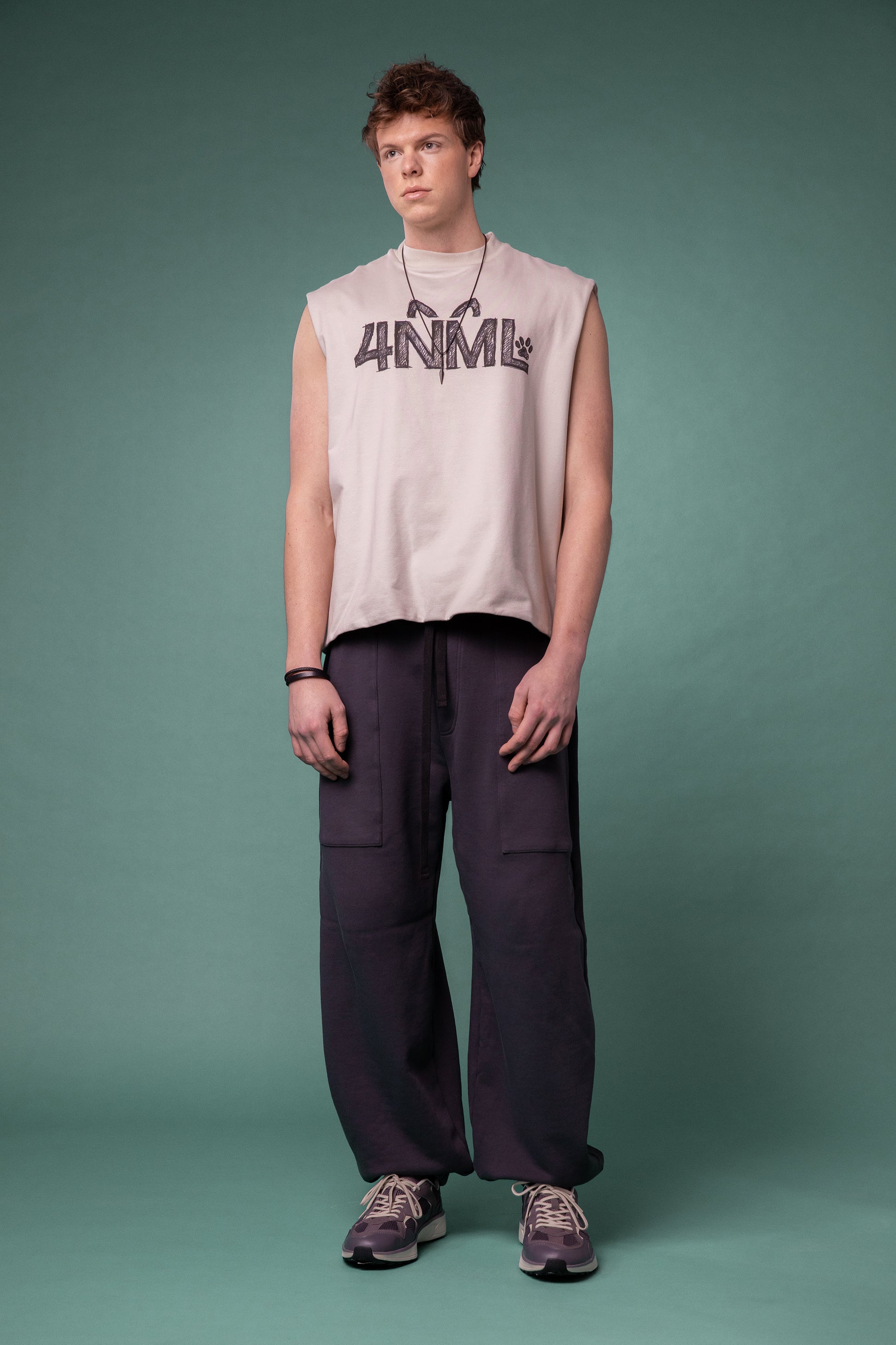 Full body view of Rough Draft tank in off-white organic cotton, relaxed fit