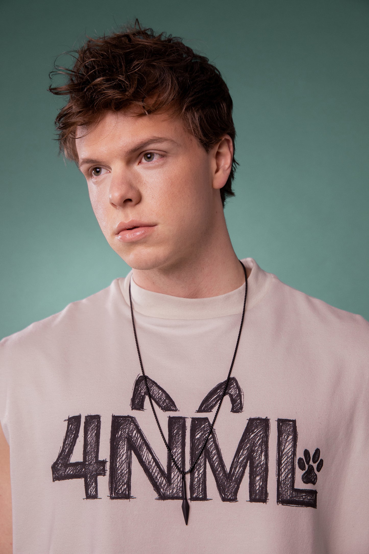 Portrait view of Rough Draft tank in off-white organic cotton with sketch graphic