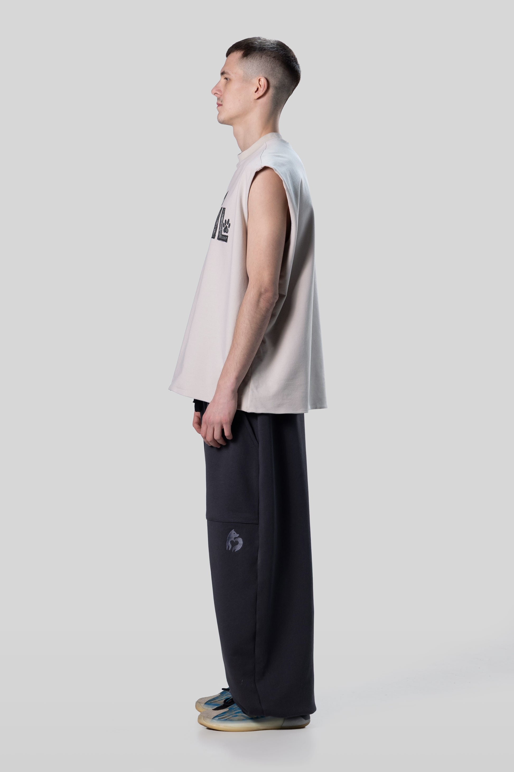 Alternate side view of Rough Draft tank with relaxed drape