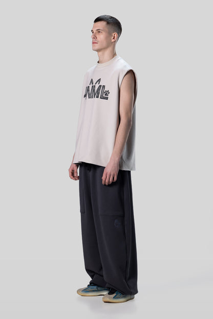 Angled side profile of Rough Draft tank in off-white organic cotton