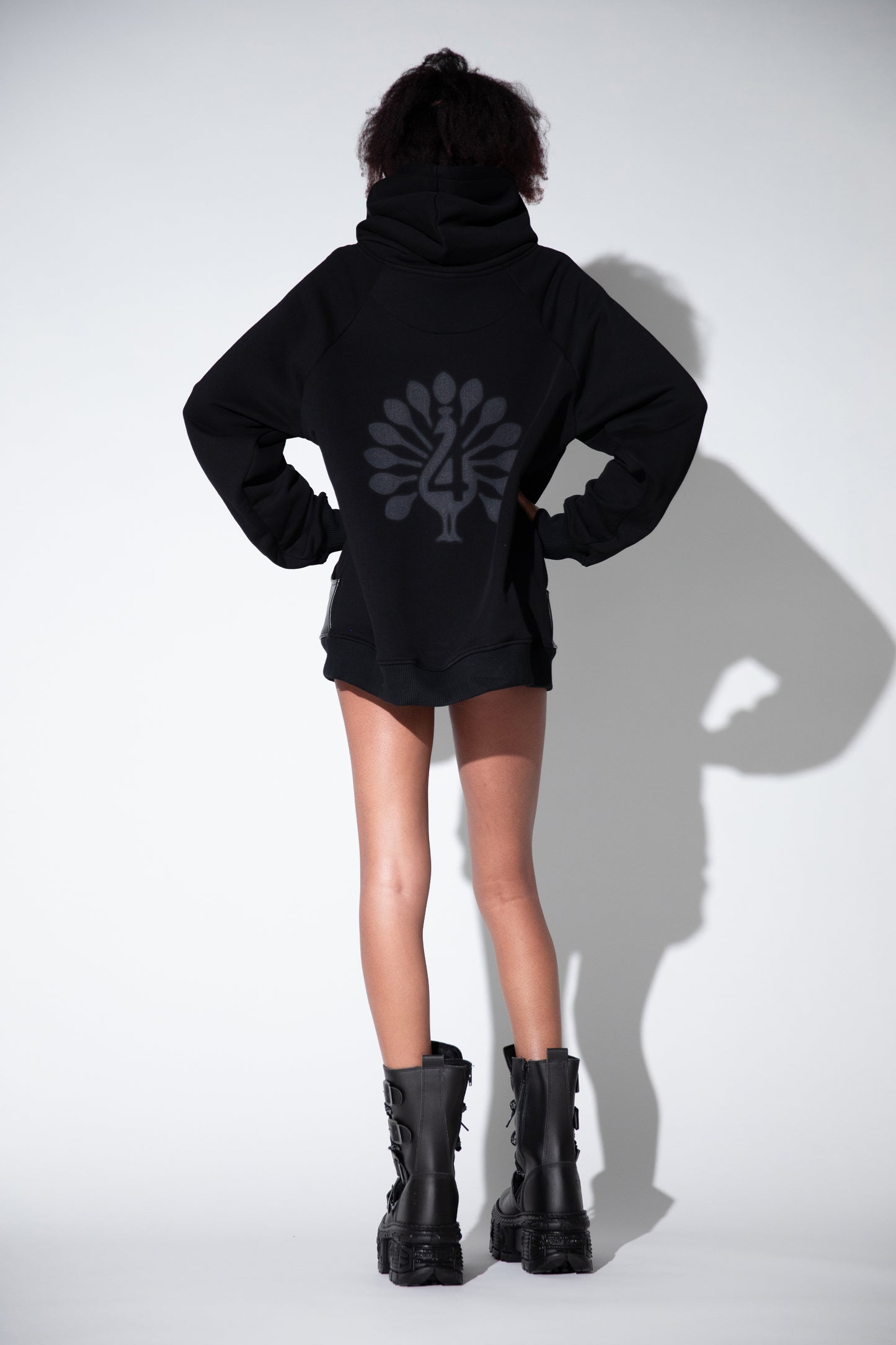 Back view of Shadow hoodie with grey peahen print