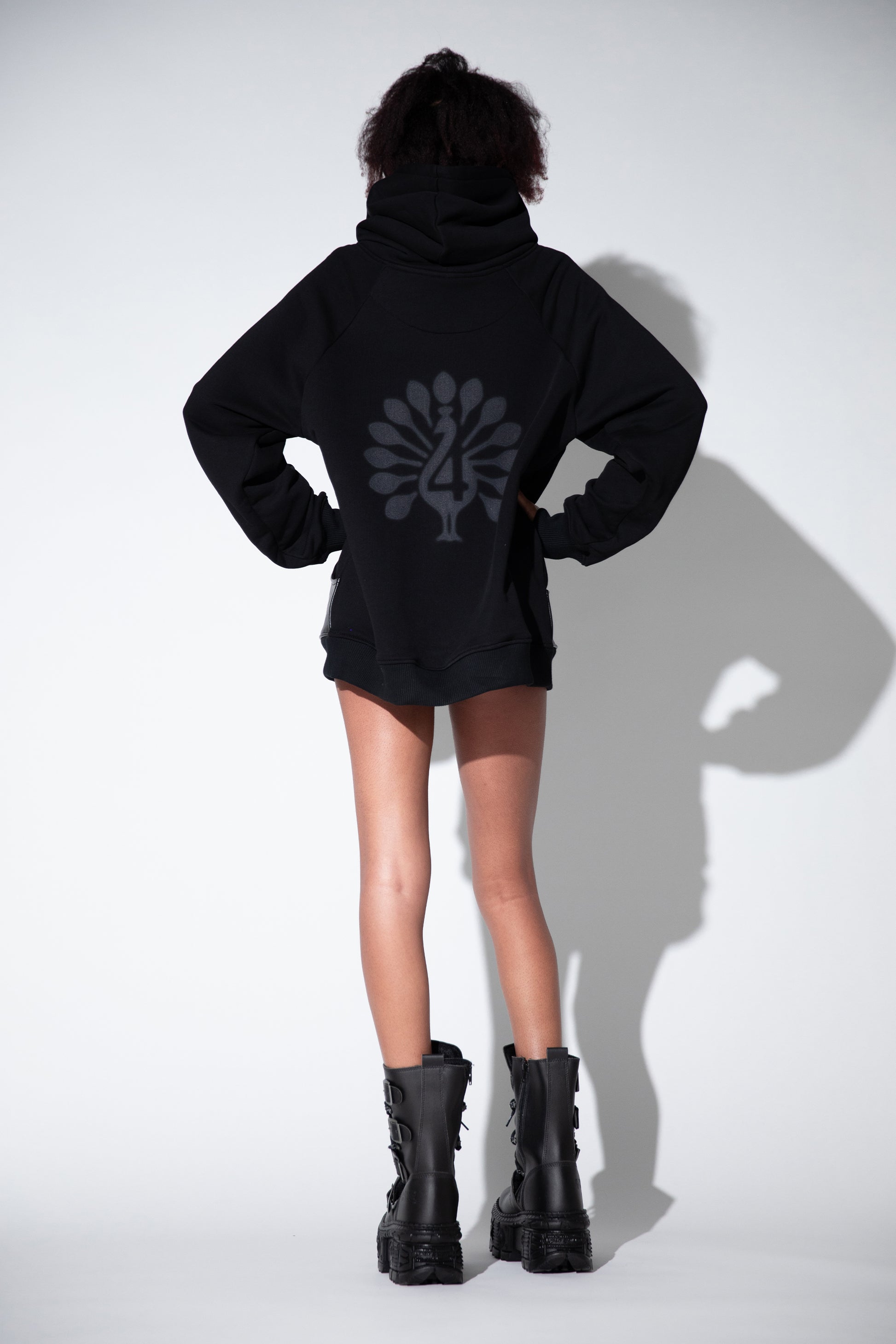 Back view of Shadow hoodie with grey peahen print