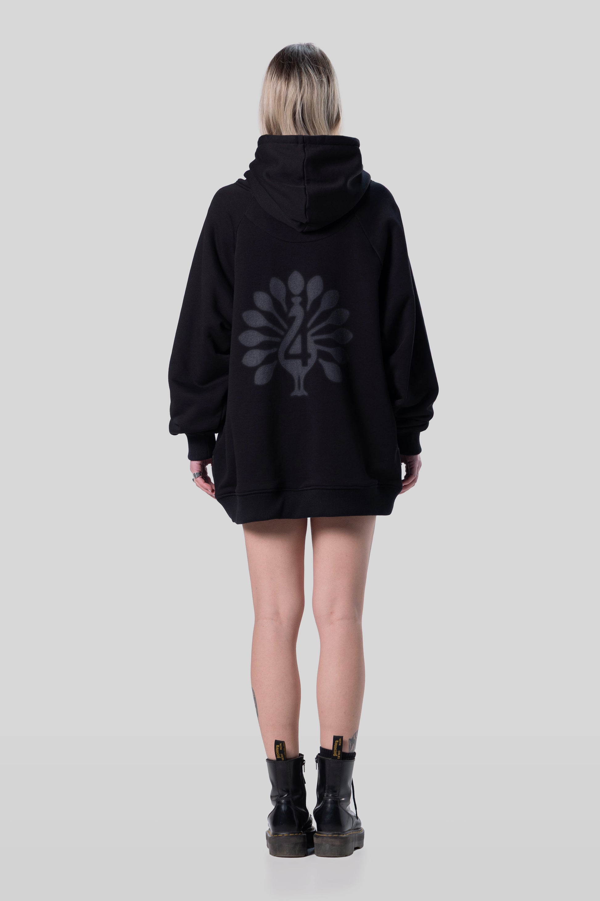 Back view of Shadow hoodie in black with printed graphic