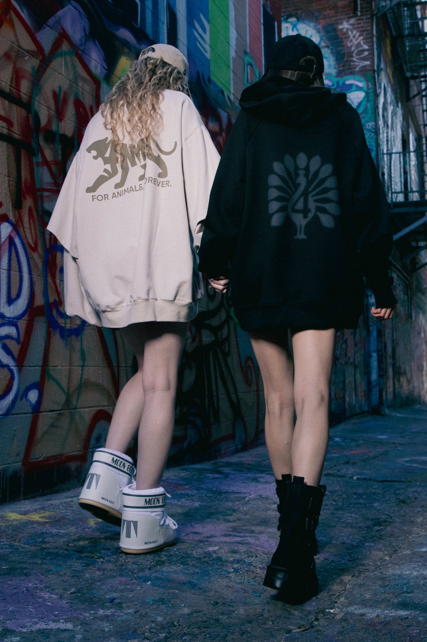 Back view of Shadow hoodie showing peahen print