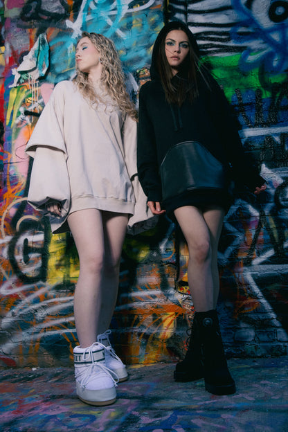 Models wearing Shadow hoodie in black, styled look