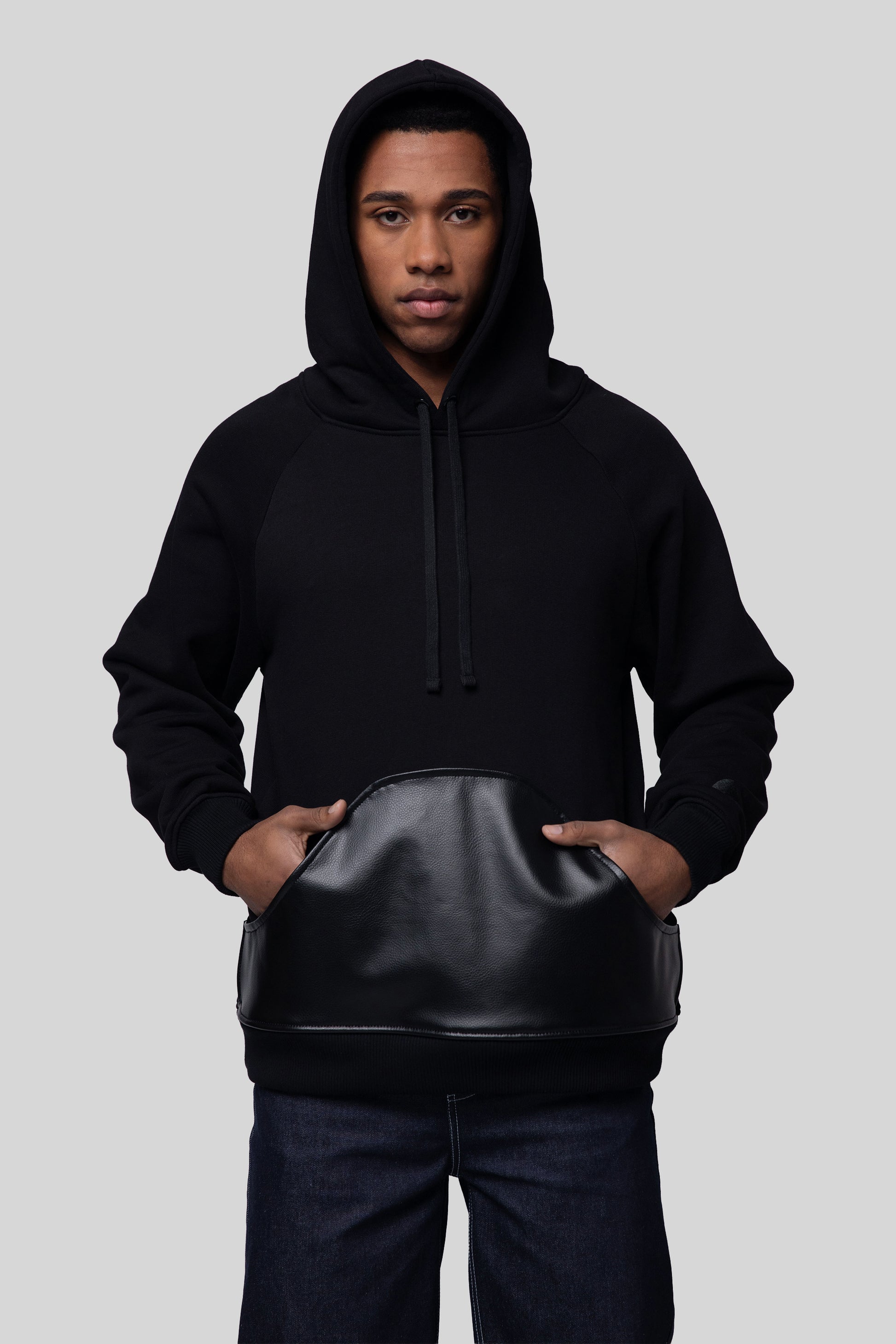 Front view of Shadow hoodie in black with AppleSkin pouch