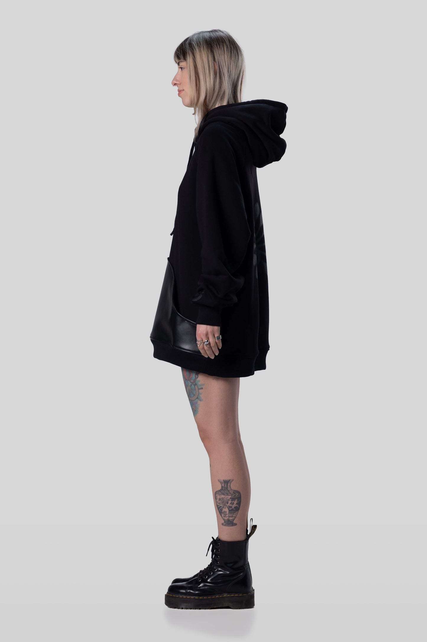 Side view of Shadow hoodie with relaxed drape