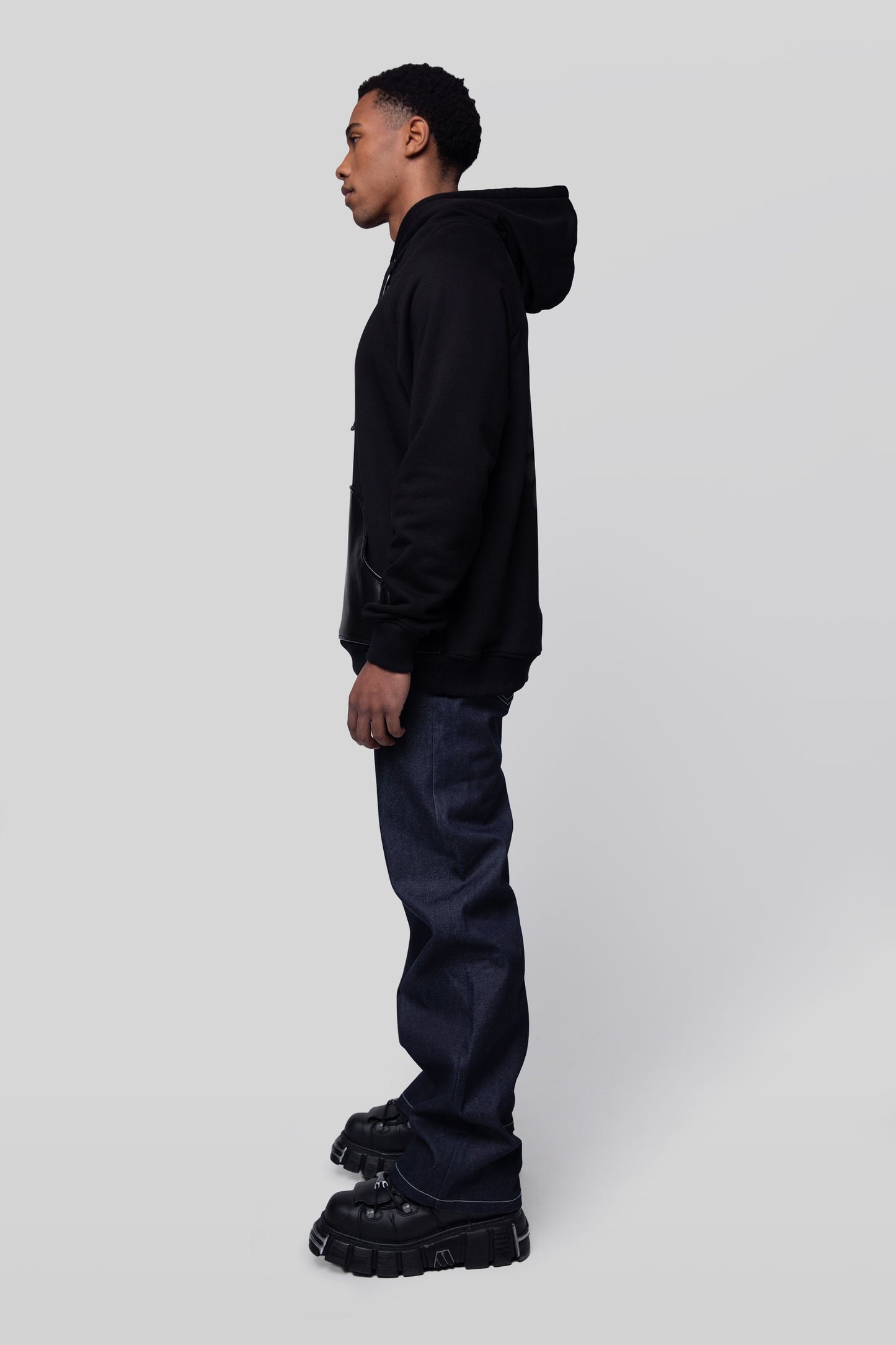 Side profile of Shadow hoodie in black