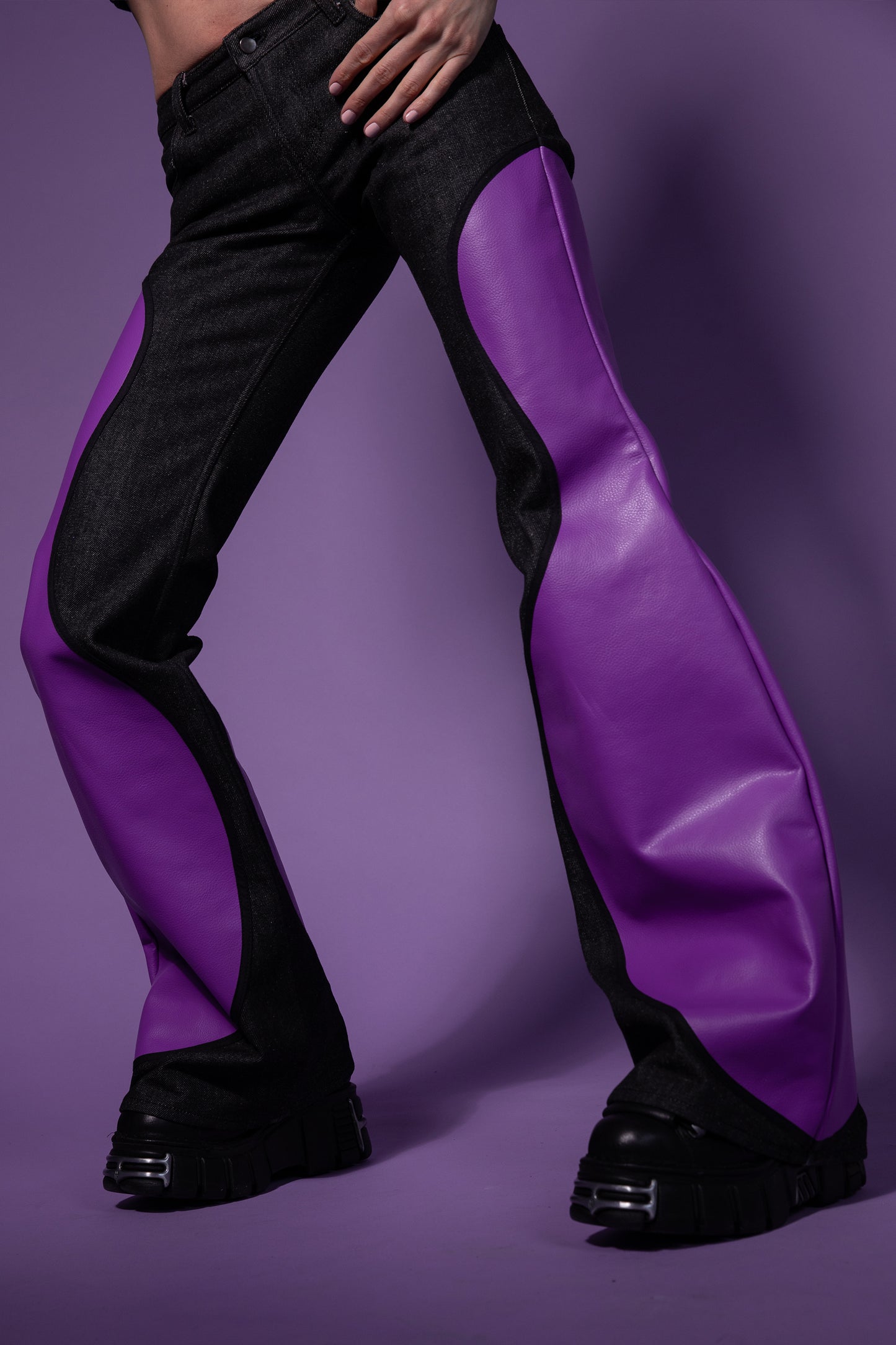 Close view of Squid jeans showing deep lavender AppleSkin panels and curved leg shape