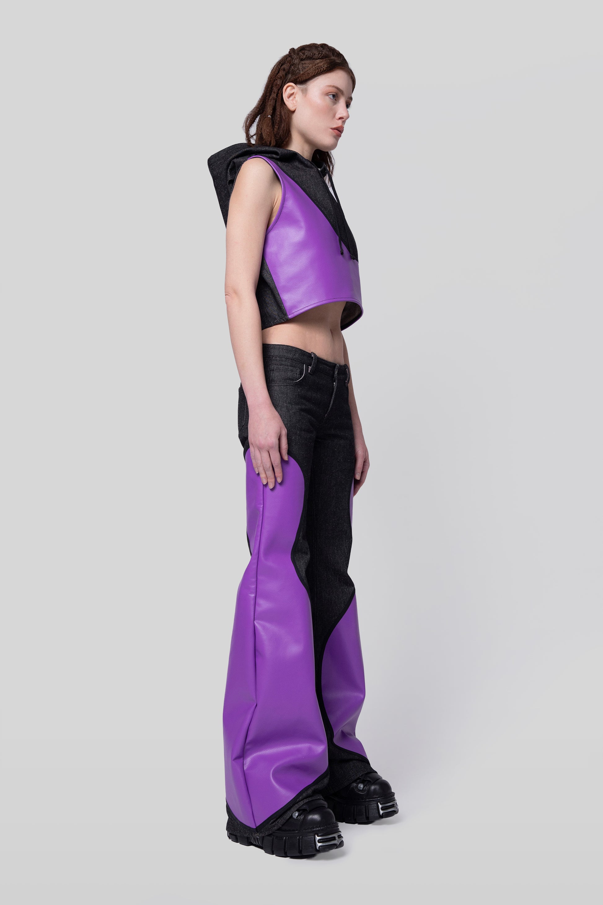 Angled right view of Squid jeans with paneled leg design