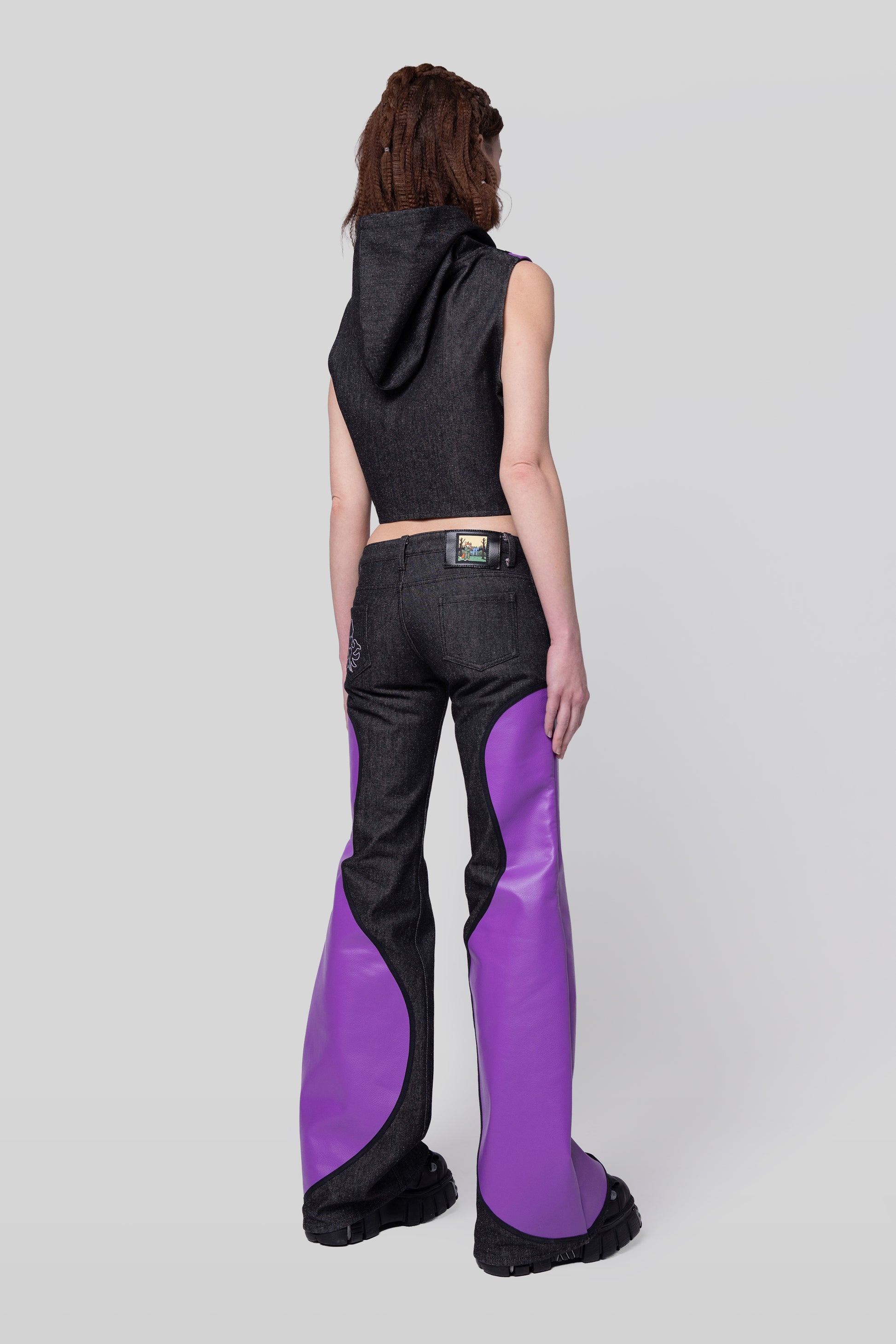 Back angled right view of Squid jeans showing panel construction