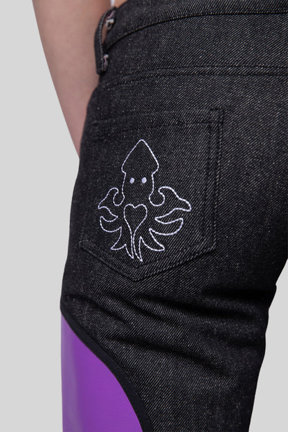 Close-up of squid embroidery on back pocket of Squid jeans