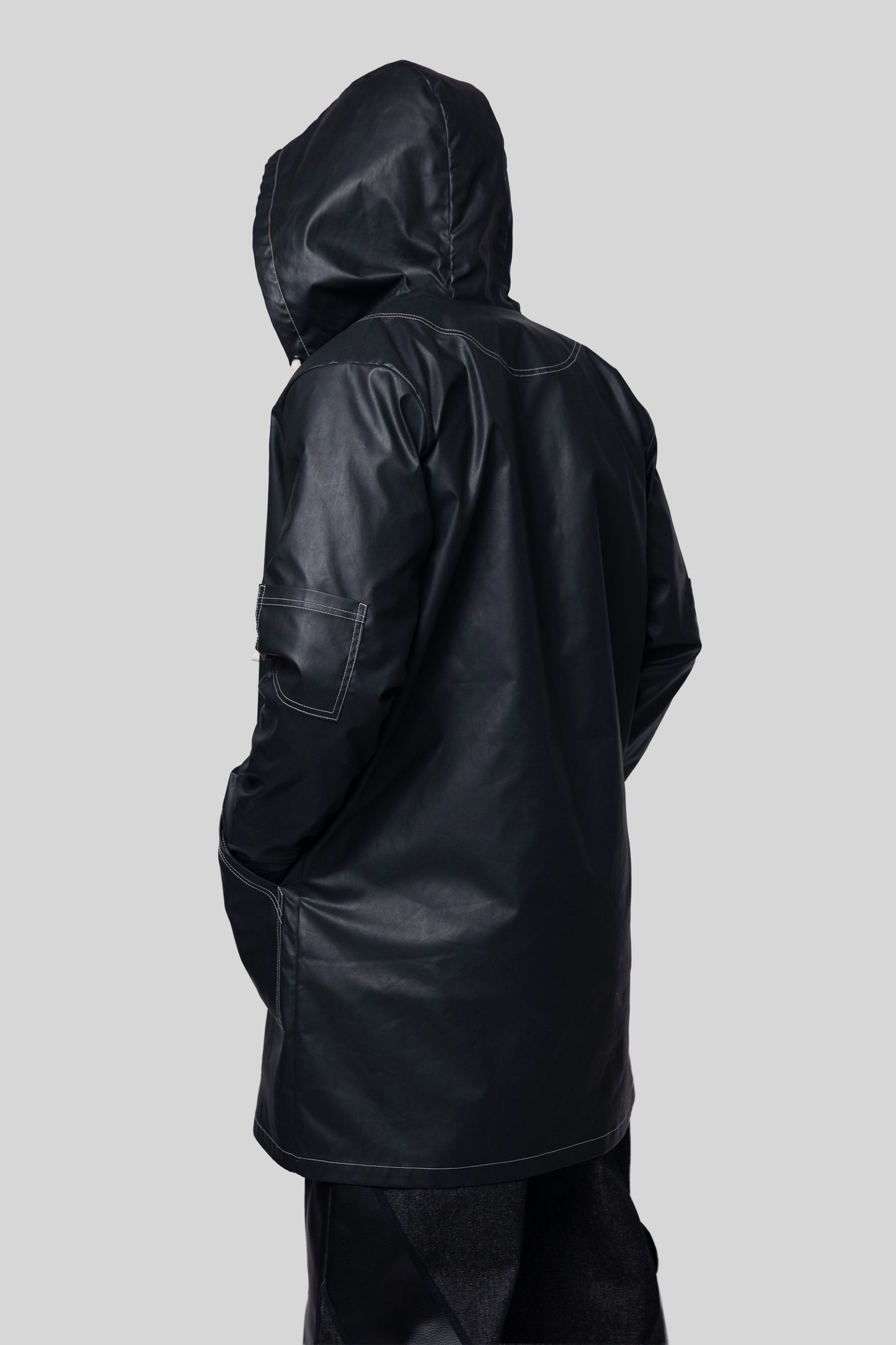 Back view of Totem coat with hood detail