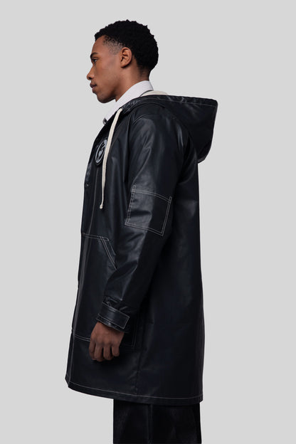 Cropped side view of Totem coat in dark grey