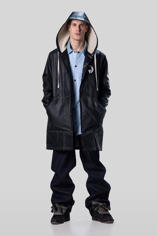 Full body view of Totem coat with hood up in dark grey
