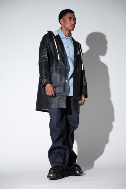 [card:men-secondary] Full body view of Totem coat in dark grey with relaxed silhouette