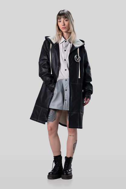 [card:women-primary] Model wearing Totem coat in dark grey with relaxed fit