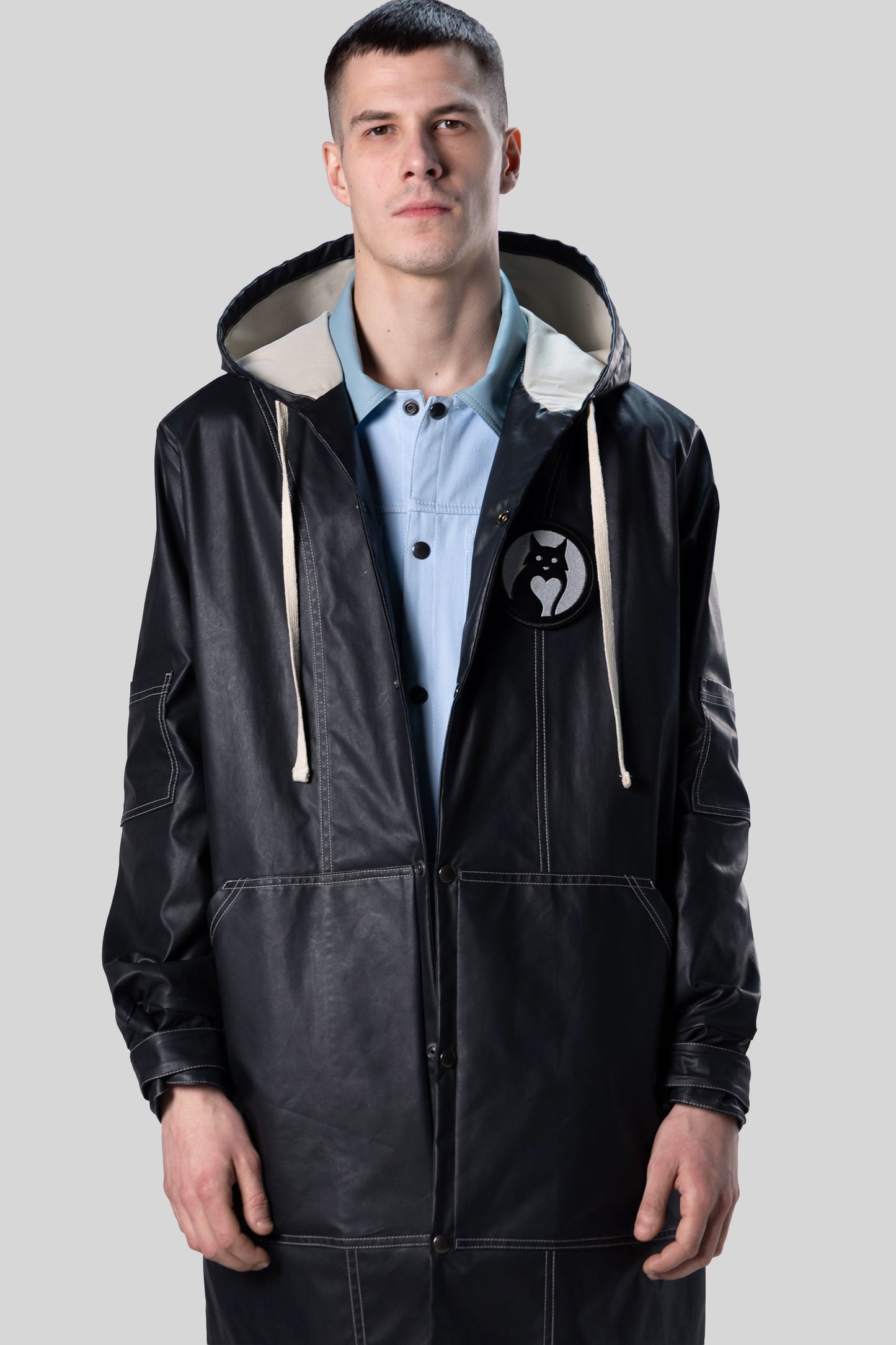 Alternate portrait of Totem coat with contrast stitching