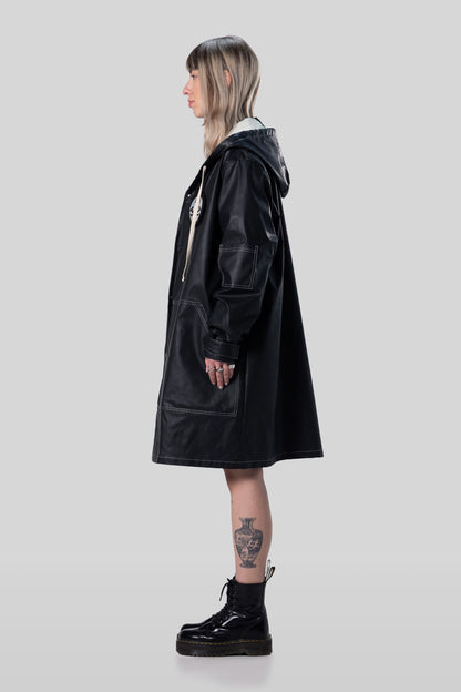 Alternate side view of Totem coat with contrast stitching