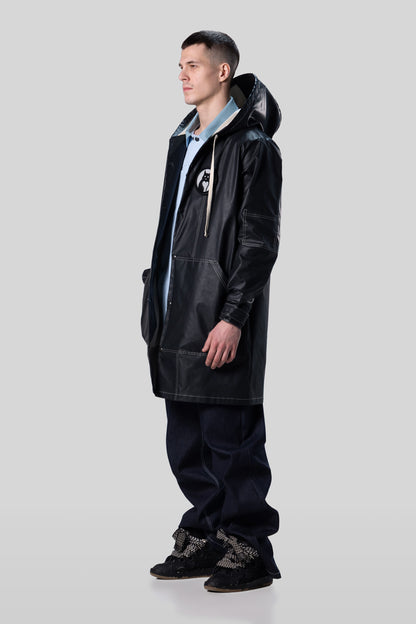 Alternate side view of Totem coat in dark grey