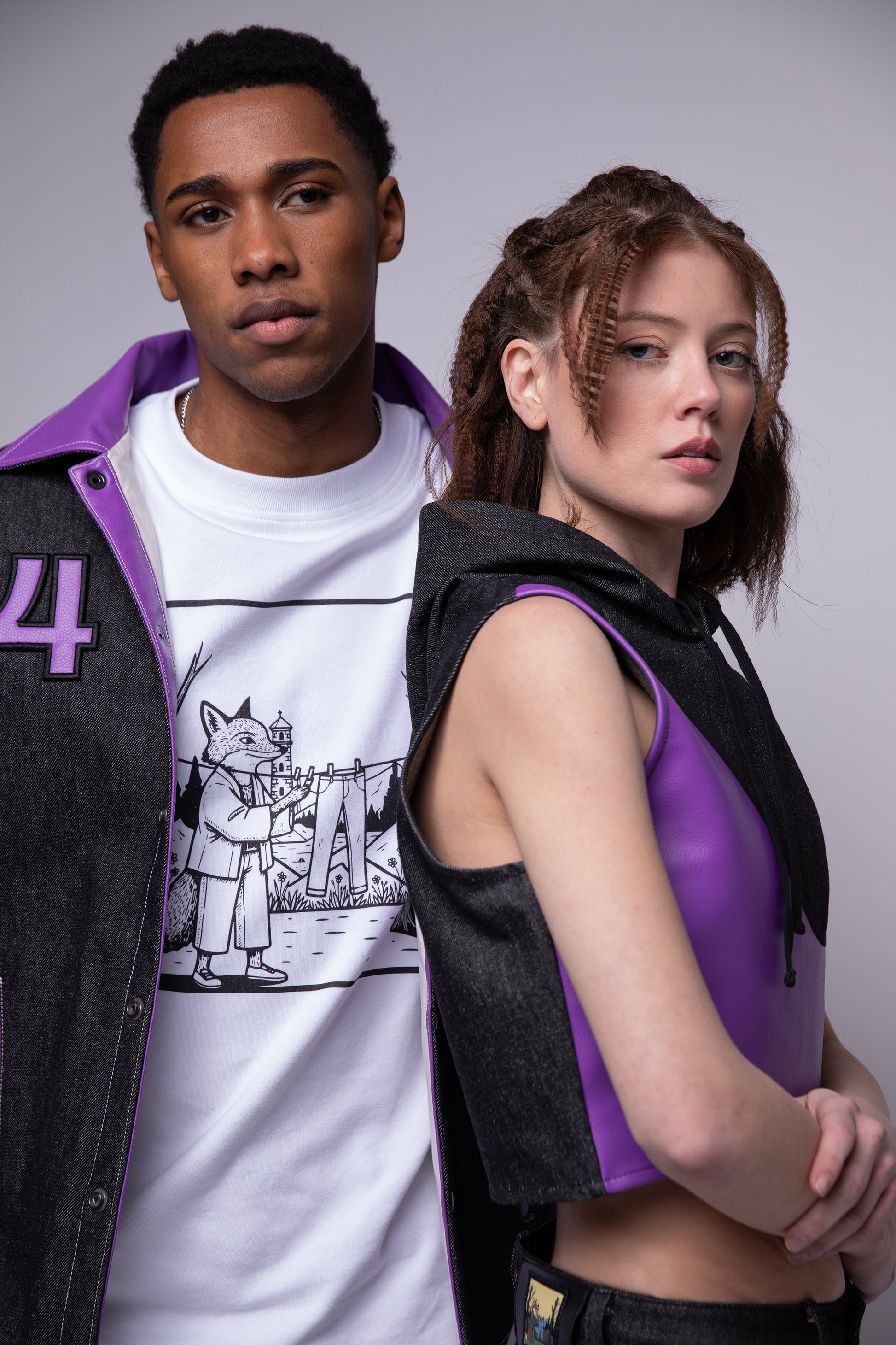 Model wearing Venom hood with Core jacket and Lineage tee, layered styling