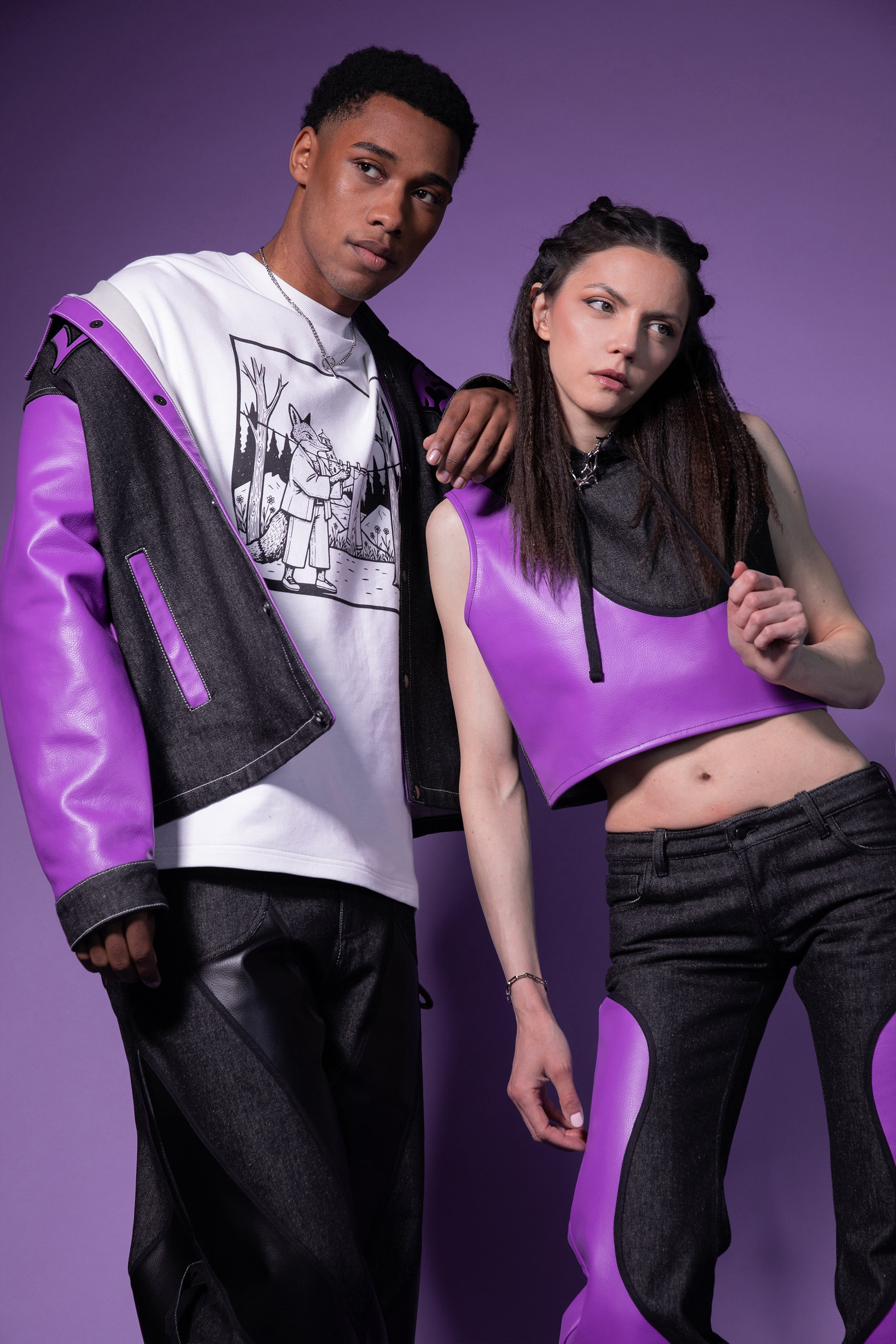 Model wearing 4NML Venom hood in carbon Candiani raw denim with deep lavender AppleSkin panel, campaign styling